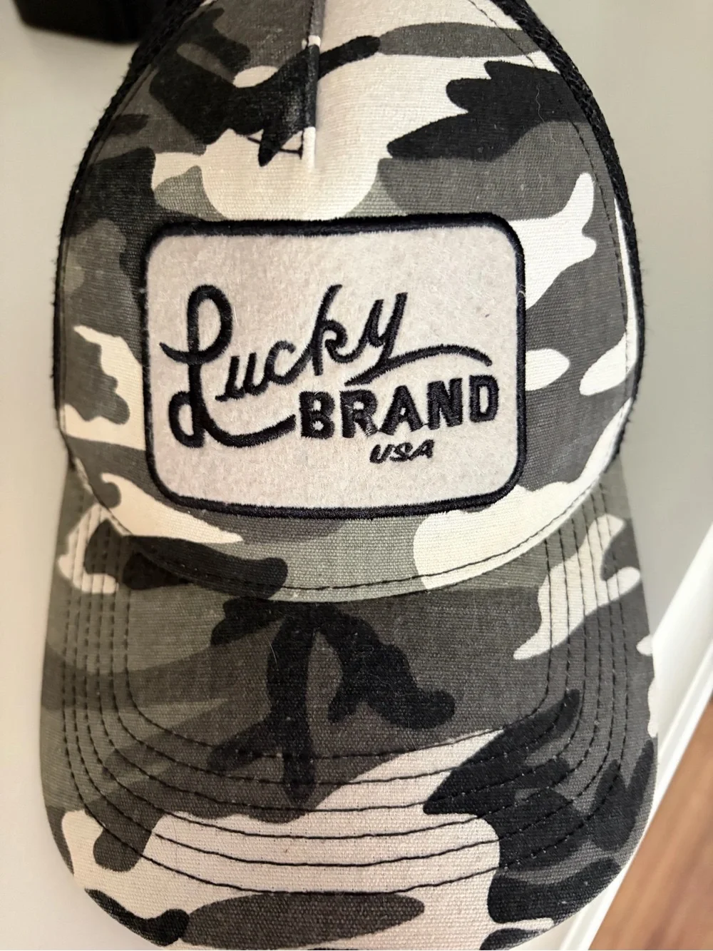 Lucky Brand Camo Trucker Hat in Green, Black, Cream